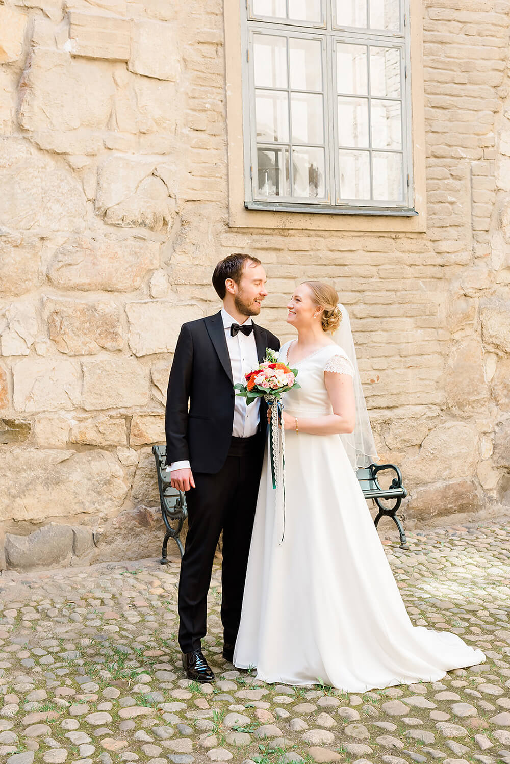 Bride and groom portraits at castle during elopement destination wedding